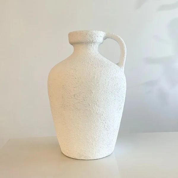 White textured pottery vase