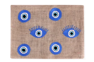 "Eyes That Sparkle: Hand-Embroidered Burlap Placemat"